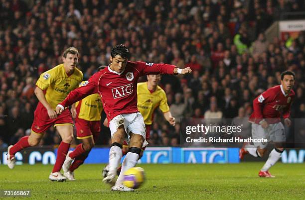 Cristiano Ronaldo of Manchester United scores his team's first goal from the penalty spot during the Barclays Premiership match between Manchester...