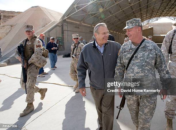 Secdef Rumsfeld Secretary Of Defense Rumsfeld Visits Troops Photos and Premium High Res ...