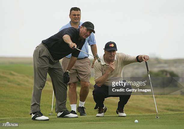 Executive Vice-president of MasterCard Worldwide Australasia Leigh Clapham calculates a shot during a MasterCard Golf Day at St Michaels Golf Club at...