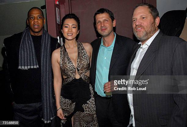 Jay-Z, actress Gong Li, director Peter Webber, and Harvey Weinstein pose at the after party for "Hannibal Rising" at Providence on January 31, 2007...