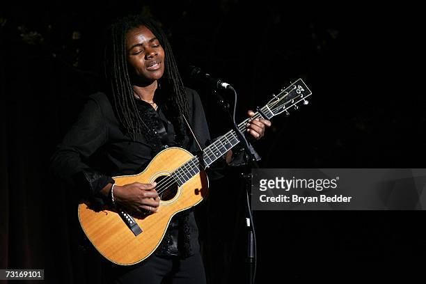Musician Tracy Chapman performs live onstage at the AmFAR Gala honoring the work of John Demsey and Whoopi Goldberg at Cipriani 42nd Street January...