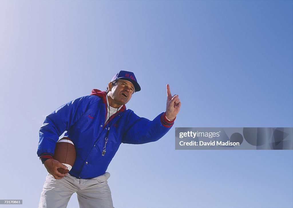 American football coach, low angle view