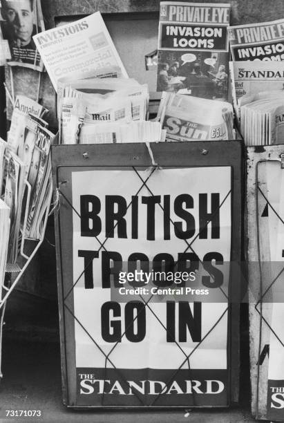 An Evening Standard headline on a London newspaper stand during the Falklands War reads: 'British Troops Go In', May 1982.
