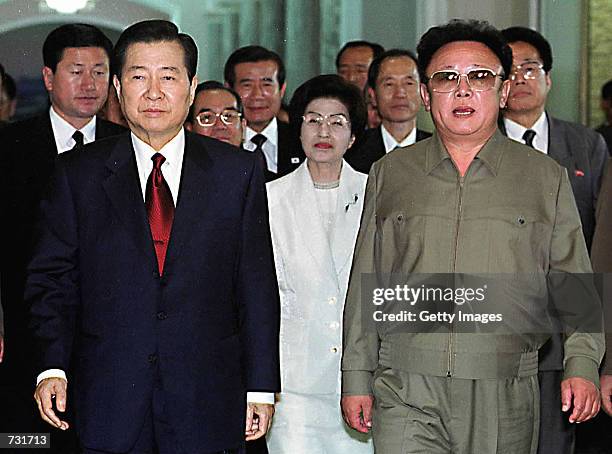 North Korean leader Kim Jong Il, right, and South Korean President Kim Dae-jung, left, meet to reconcile political differences as Kim Dae-jung...