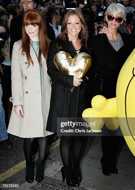 Singers Nicola Roberts, Kimberley Walsh and Sarah Harding of band Girls Aloud help launch the Gold Heart Appeal outside Harrods on February 1, 2007...