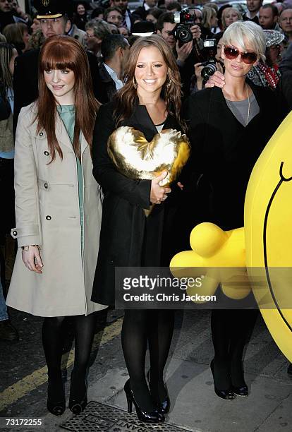 Singers Nicola Roberts, Kimberley Walsh and Sarah Harding of band Girls Aloud help launch the Gold Heart Appeal outside Harrods on February 1, 2007...