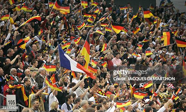 Lone French flag is seen among many German flags during their Germany-France semi-final match of the Men's Handball World Championship, 01February...