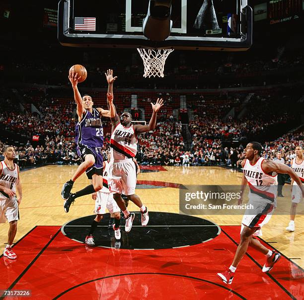 Kevin Martin of the Sacramento Kings drives to the basket for a layup against Zach Randolph of the Portland Trail Blazers during a game at The Rose...