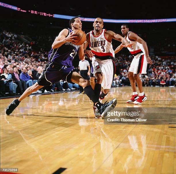 Kevin Martin of the Sacramento Kings drives to the basket against Juan Dixon of the Portland Trail Blazers during a game at The Rose Garden on...