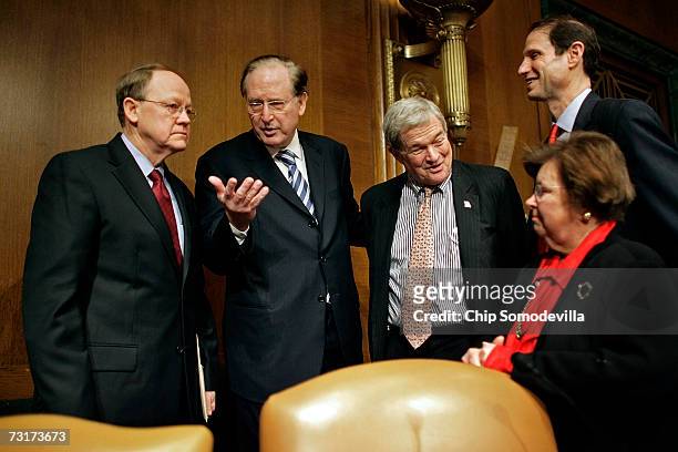 Retired Navy Vice Admiral Michael McConnell is greeted by US Senate Intelligence Committee John Rockefeller , committee ranking Republican...