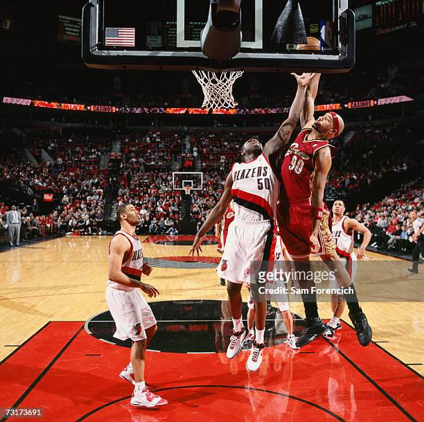 Drew Gooden of the Cleveland Cavaliers takes the ball to the basket against Zach Randolph of the Portland Trail Blazers during a game at The Rose...