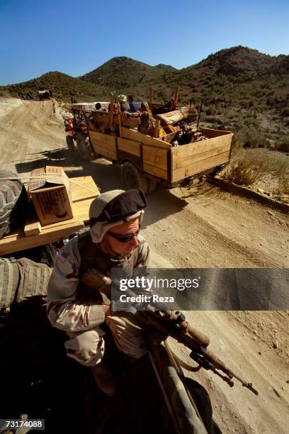 American soldiers go on patrol with their Humvee car in the village of Shkin and around in the Pashtun tribal zone of Waziristan on July, 2004 in...