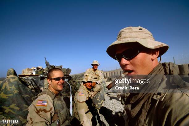 American soldier of the alpha company, Second Battalion, 27th Infantry Regiment smoking a cigare on July, 2004 in Afghanistan.