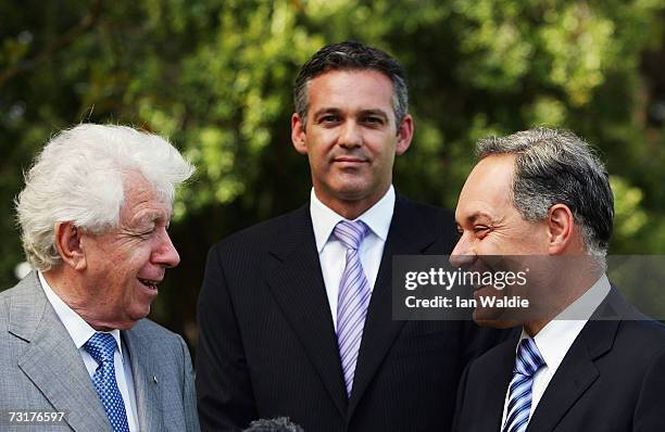 Chairman of the Football Federation of Australia Frank Lowy, CEO of the FFA Ben Buckley, and New South Wales Premier Morris Iemma hold a press...