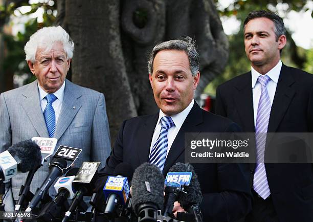 Chairman of the Football Federation of Australia Frank Lowy, CEO of the FFA Ben Buckley, and New South Wales Premier Morris Iemma hold a press...