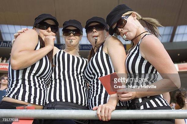 Fans wearing fancy dress pose during the IRB New Zealand Sevens at the Westpac Stadium February 02, 2007 in Wellington, New Zealand.