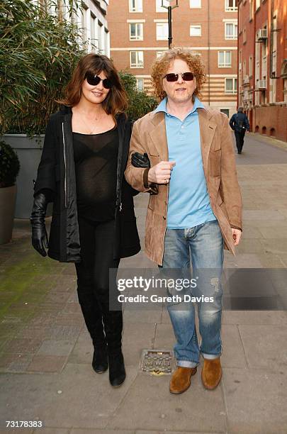 Musician Mick Hucknall and girlfriend Gabriella Wesberry walk in Covent Garden on February 1, 2007 in London. The couple announced today that they...