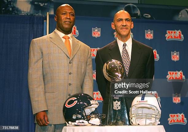 Head coaches, Lovie Smith of the Chicago Bears and Tony Dungy of the Indianapolis Colts pose together with the Super Bowl Trophy during a press...