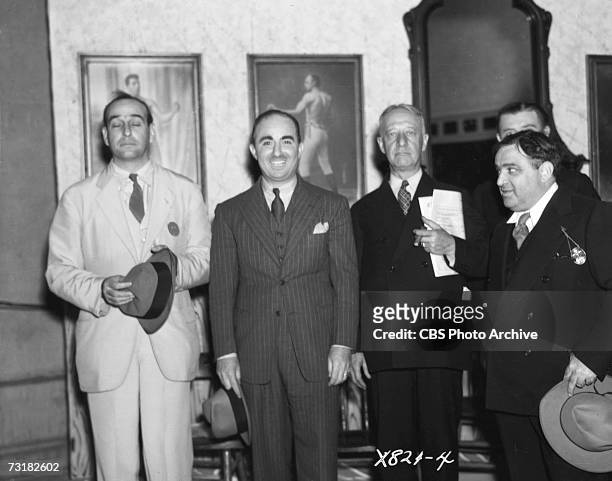 Assembled in a replica barbershop in Central Park for an amateur barbershop quartet singing contest are, from left, American public official and city...