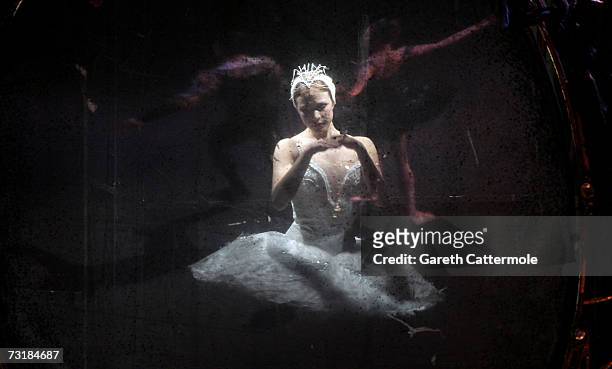 Ballerina is reflected in a mirror during a dress rehearsal for Swan Lake at the Royal Opera House, Covent Garden on February 2, 2007 in London,...