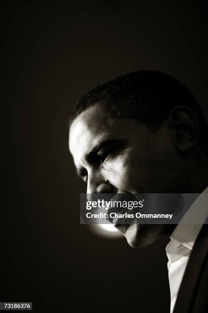 Senator Barack Obama works a crowd during a surprise visit to a coffee shop in Portsmouth, N.H., Sunday, Dec. 10, 2006. Obama drew large crowds...