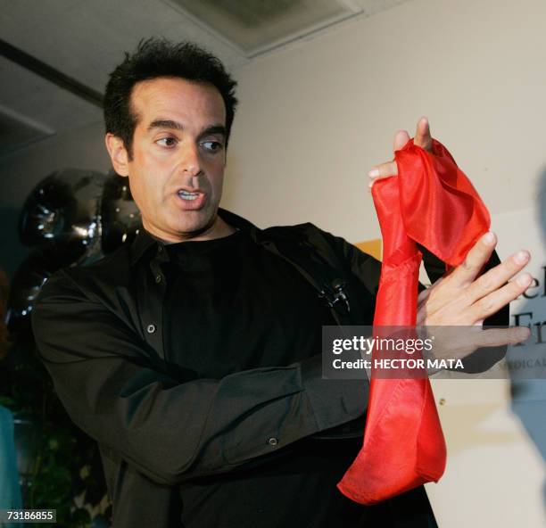 Inglewood, UNITED STATES: Entertainer David Copperfield performs magic tricks in front of an audience of magicians, physical therapists and patients...