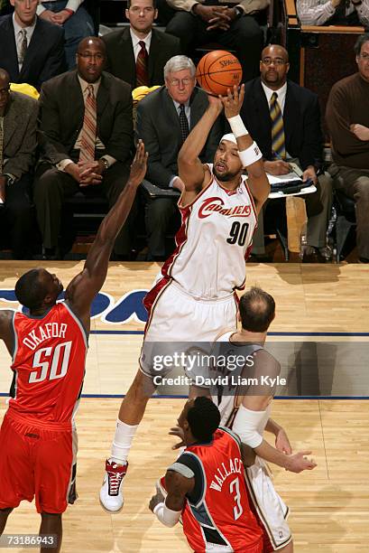 Drew Gooden of the Cleveland Cavaliers puts one up for two over Emeka Okafor of the Charlotte Bobcats at The Quicken Loans Arena February 2, 2007 in...