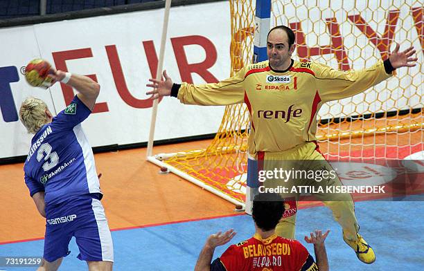 Spanish goalkeeper Jose Hombrados controls the shot of Iceland's Logi Geirsson during the Spain vs Iceland match for 7th place of the 2007 Handball...