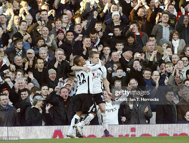 Heidar Helguson of Fulham celebrates scoring a goal with teammate Wayne Routlage during the Barclays Premiership match between Fulham and Newcastle...