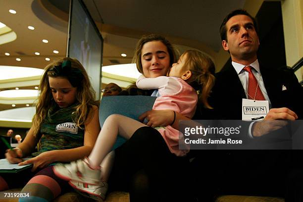 Senator Joseph Biden's family , grandchildren Finnegan, Naomi, Natalie and son Beau, sit in the front row at the Democratic National Committee winter...