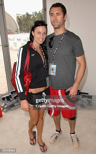 Olympic swimmer Amanda Beard and guest pose for a photograph at The Sprint Style Villa during Super Bowl XLI week on February 03, 2007 in Miami...
