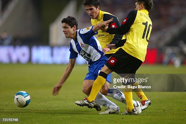 Julian of Espanyol and Zapater and D'Alessandro of Zaragoza in action during the match between RCD Espanyol and Real Zaragoza, of La Liga at the...