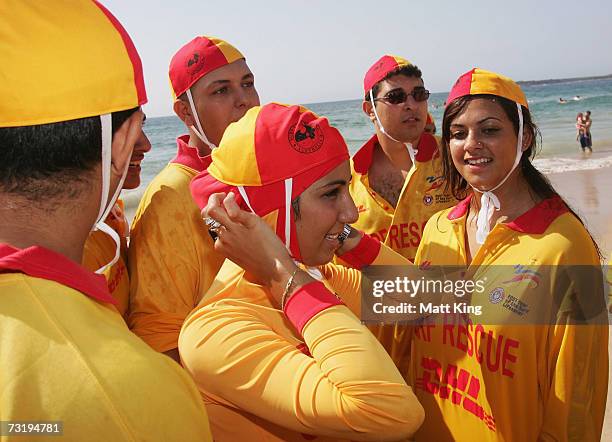 Mecca Laa Laa adjusts her 'Burqini' on her first surf lifesaving patrol at North Cronulla Beach February 4, 2007 in Sydney, Australia. The red and...