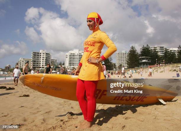 Mecca Laa Laa wears a 'Burqini' on her first surf lifesaving patrol at North Cronulla Beach February 4, 2007 in Sydney, Australia. The red and yellow...