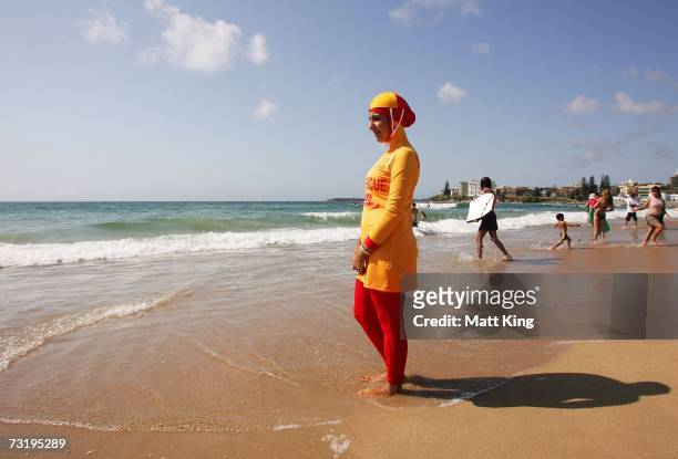Mecca Laa Laa wears a 'Burqini' on her first surf lifesaving patrol at North Cronulla Beach February 4, 2007 in Sydney, Australia. The red and yellow...