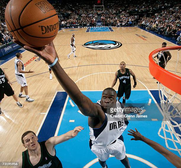DeSegana Diop of the Dallas Mavericks goes for the basket against the Minnesota Timberwolves on February 3, 2007 at the American Airlines Center in...