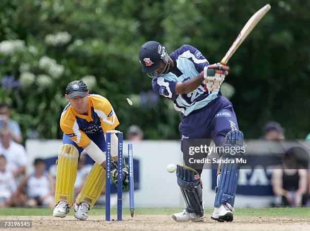 Mayu Pasupati of Auckland gets bowled by Nic Turner during the Twenty20 Final match between State Auckland Aces and State Otago Volts at Eden Park...