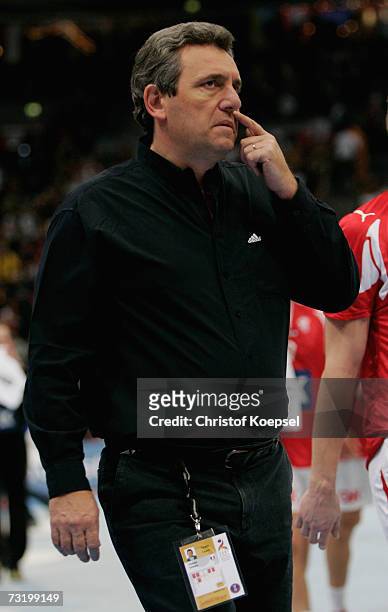 Head coach Claude Onesta of France looks dejected after the IHF World Championship third place game between France and Denmark at the Cologne Arena...