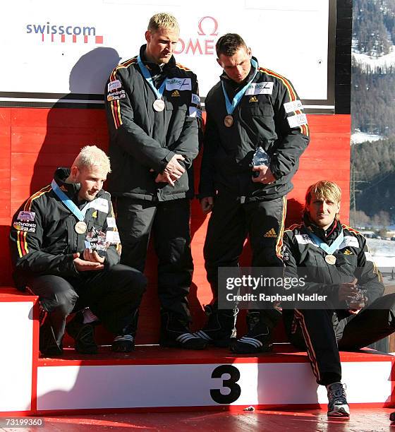 Andre Lange, Rene Hoppe, Martin Putze and Kevin Kuske of Germany seen after placing third in the Four Man Bobsleigh event at the Bobsleigh World...
