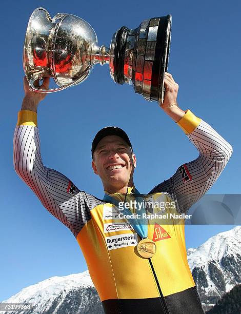 Ivo Rueegg of Switzerland poses with the trophy after winning the Four Man Bobsleigh event at the Bobsleigh World Championships on February 04, 2007...