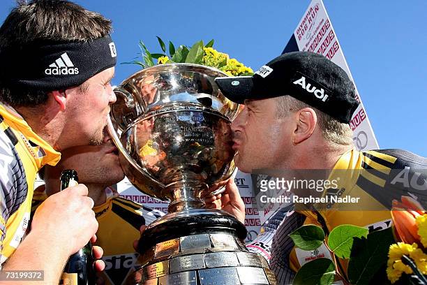 Beat Heft and Ivo Rueegg kiss the trophy after winning the Four Man Bobslaeigh event at the Bobsleigh World Championships on February 04, 2007 in St....