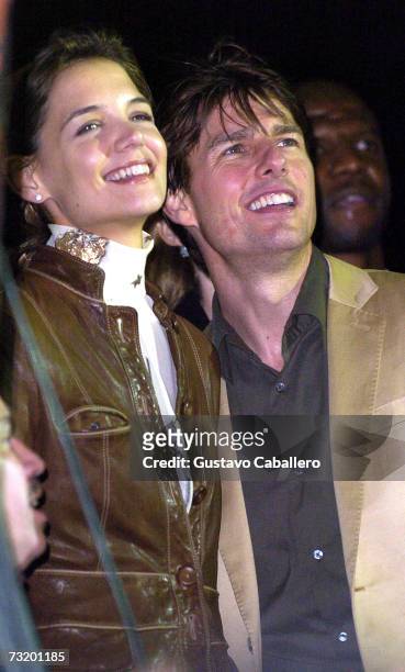 Katie Holmes and Tom Cruise watch the Jennifer Lopez and Marc Anthony show at The MarketAmerica.com SUPER XLI PARTY at 8th Street and Ocean Drive on...