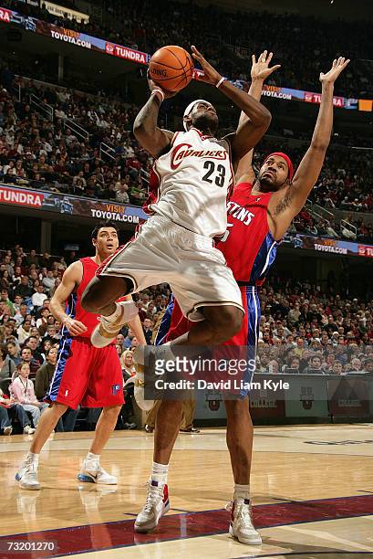 LeBron James of the Cleveland Cavaliers gets the step on Rasheed Wallace of the Detroit Pistons on February 04, 2007 at The Quicken Loans Arena in...