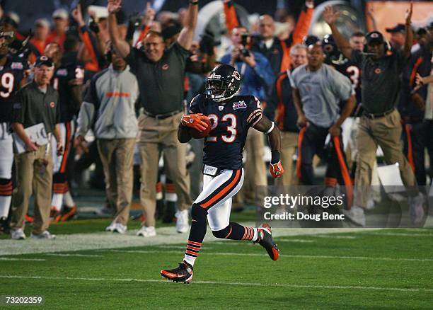 Kick returner Devin Hester of the Chicago Bears returns the openning kickoff 92-yards for a touchdown against the Indianapolis Colts in the first...