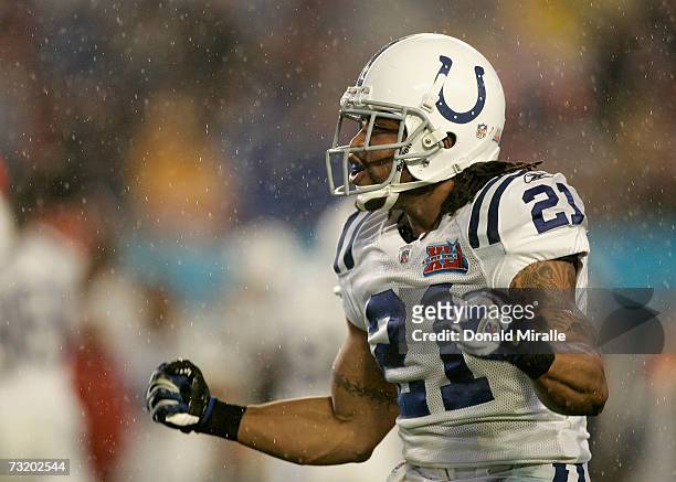 Safety Bob Sanders of the Indianapolis Colts celebrates after his tackle of Cedric Benson of the Chicago Bears for the Colts to recover the fumble in...
