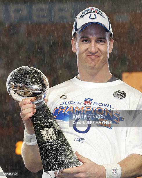 Indianapolis Colts quarterback Peyton Manning holds the Vince Lombardi trophy after his team won Super Bowl XLI against the Chicago Bears 04 February...