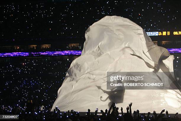 Musician Prince performs during half-time 04 February 2007 at Super Bowl XLI at Dolphin Stadium in Miami between the Chicago Bears and the...