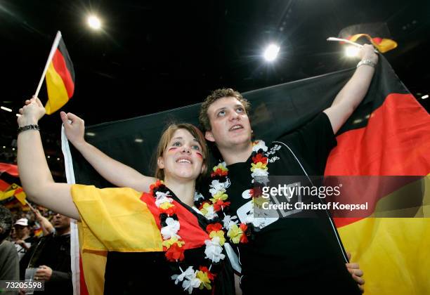 German fans celebrate before the IHF World Championship final between Germany and Poland at the Cologne Arena on February 4, 2007 in Cologne, Germany.