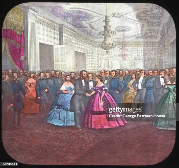 Illustration shows American President Abraham Lincoln as he greets guests during a formal reception and ball, Washington DC, 1860s. The image was...