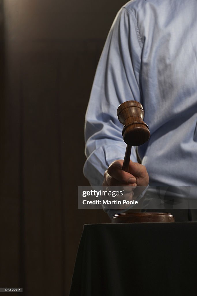 Man using gavel, close-up